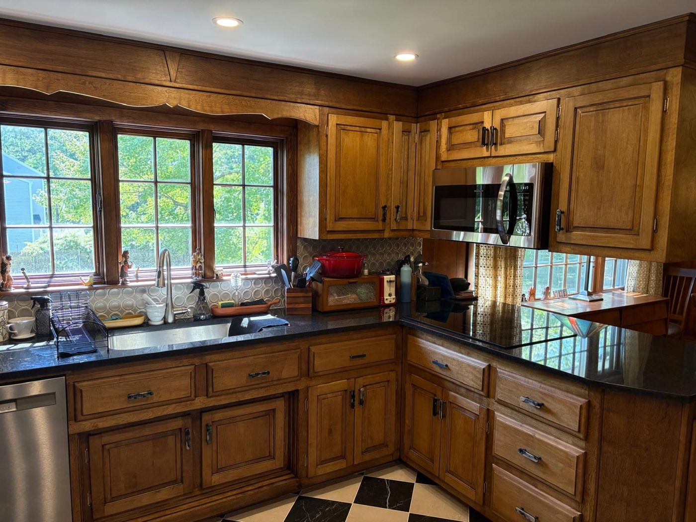Finished cabinets around the sink